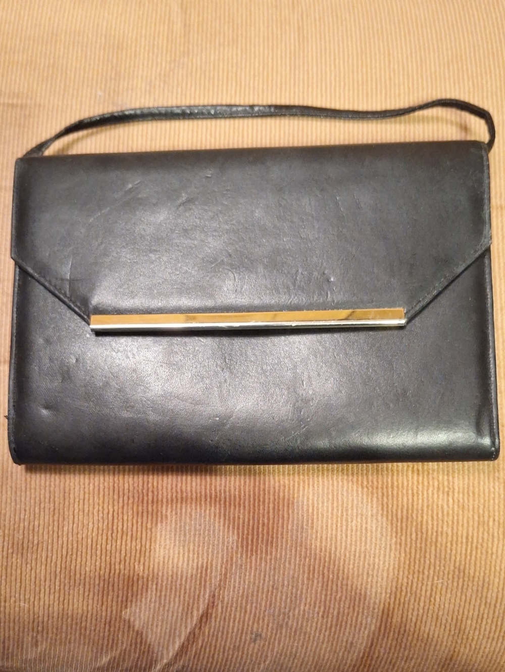 Elegant Black Vintage Leather Wristlet Clutch with Gold Bar Accent